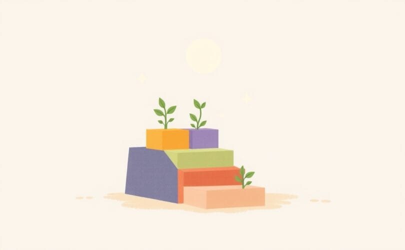 Ścieżka z kolorowych klocków, delikatne kiełkujące pędy, spokojny horyzont.