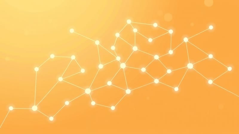 Stylizowana ilustracja sieci neuronowej w ciepłych barwach, symbolizująca korę ruchową i ruch.