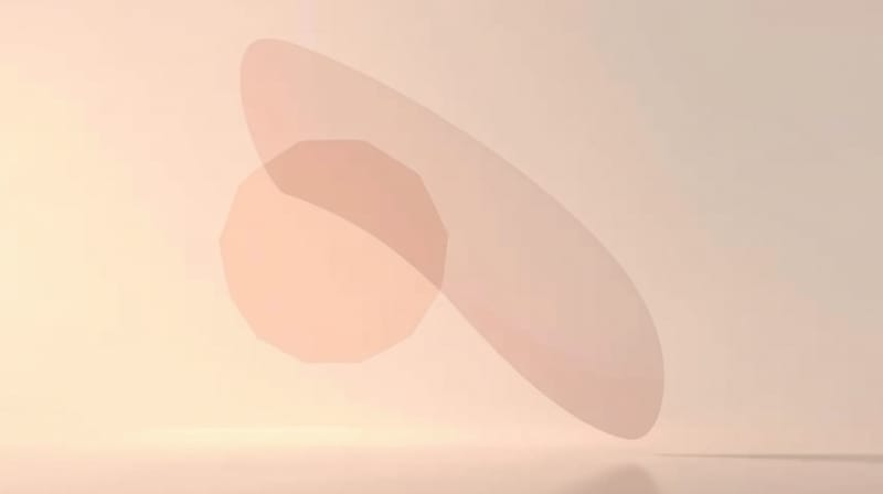 Dwie abstrakcyjne, unoszące się kształty o pastelowych barwach, z subtelnym kontrastem jasności i zaznaczenia.